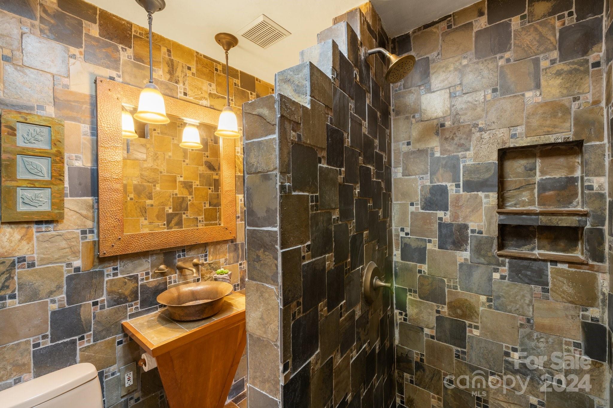 2 Devonshire Place Asheville, NC 28803 - Photo 17 of 47 a bathroom with a sink toilet and shower