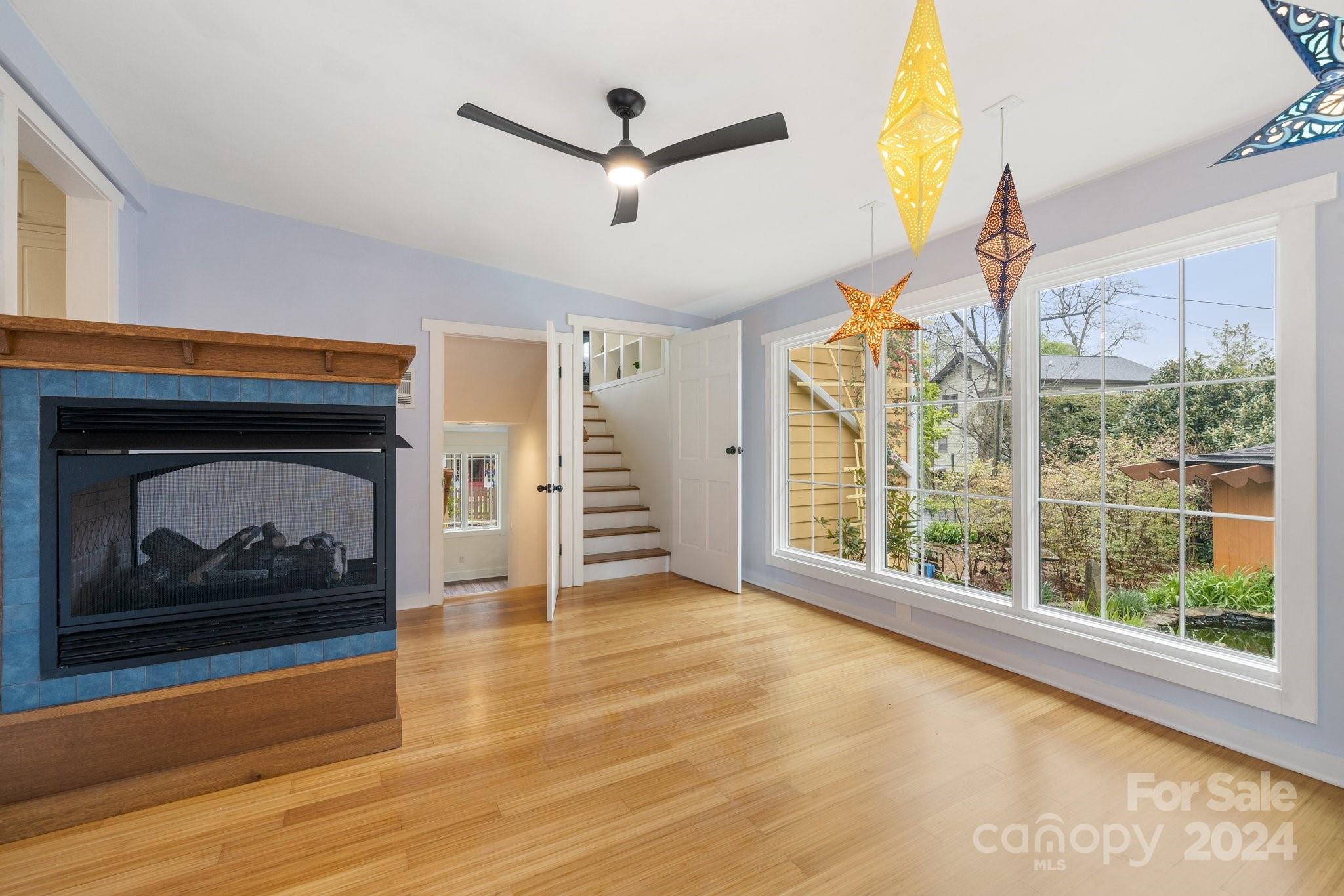 2 Devonshire Place Asheville, NC 28803 - Photo 19 of 47 a living room with furniture and a fireplace