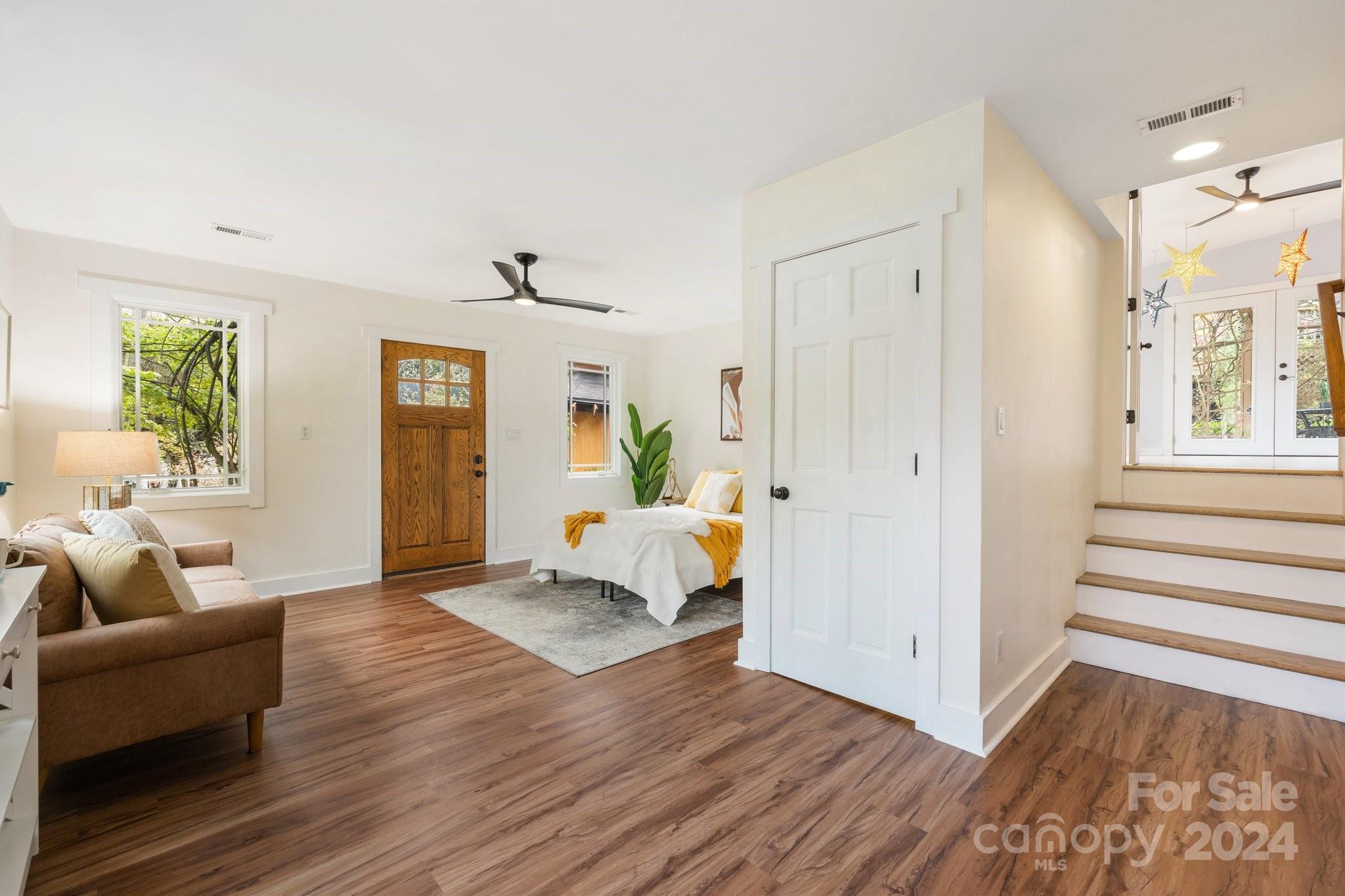 2 Devonshire Place Asheville, NC 28803 - Photo 26 of 47 a living room with furniture and a wooden floor