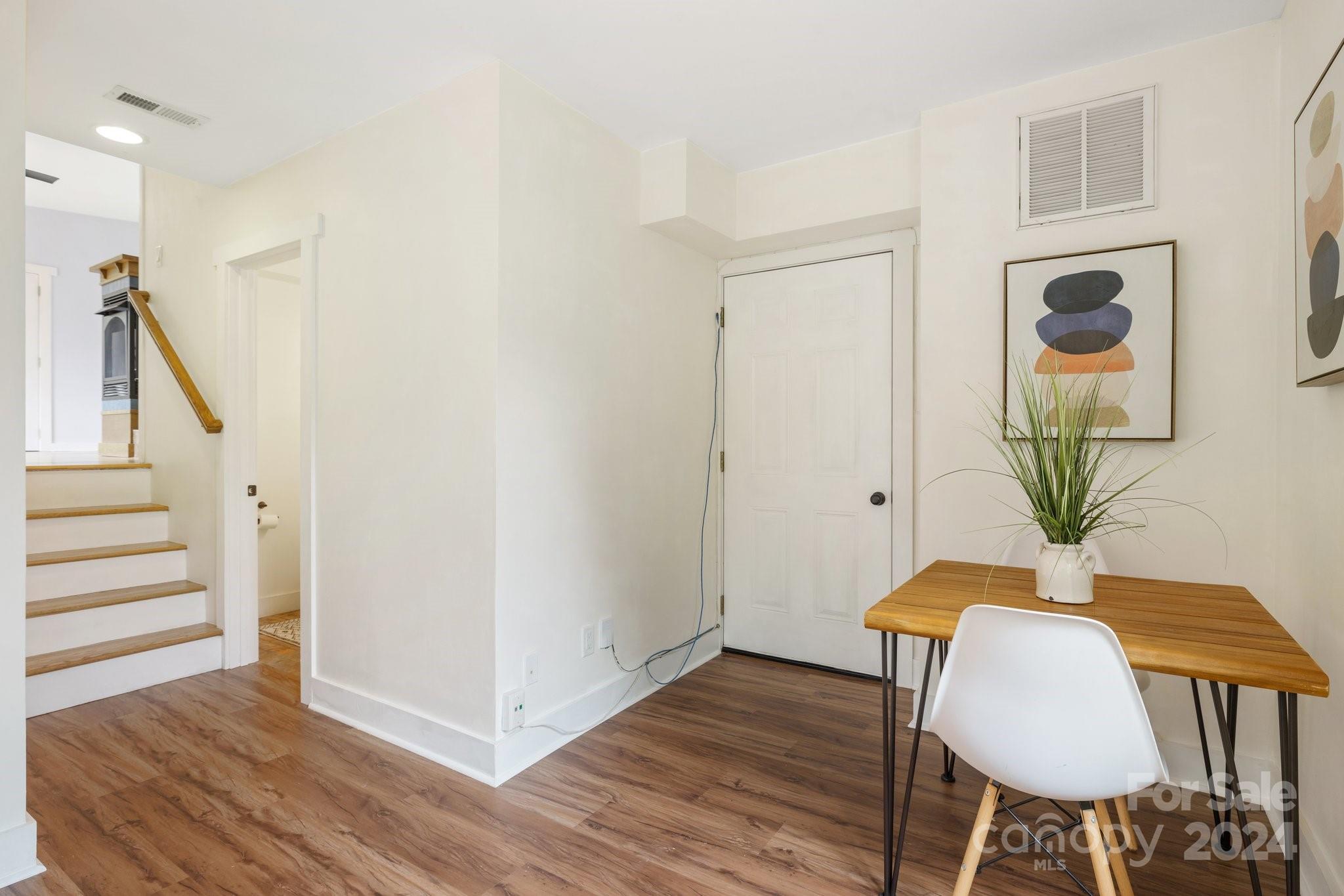 2 Devonshire Place Asheville, NC 28803 - Photo 27 of 47 a view of a livingroom with furniture and wooden floor