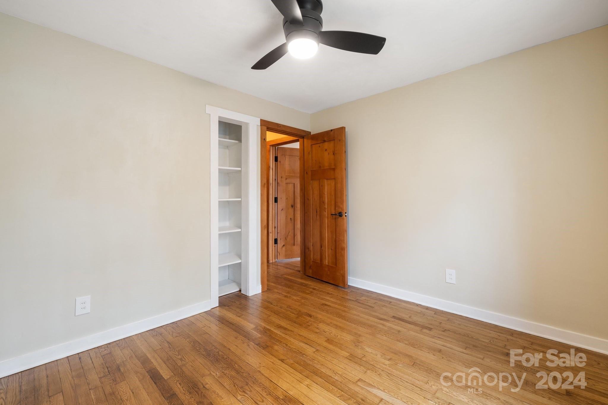 2 Devonshire Place Asheville, NC 28803 - Photo 34 of 47 a view of empty room with wooden floor and fan
