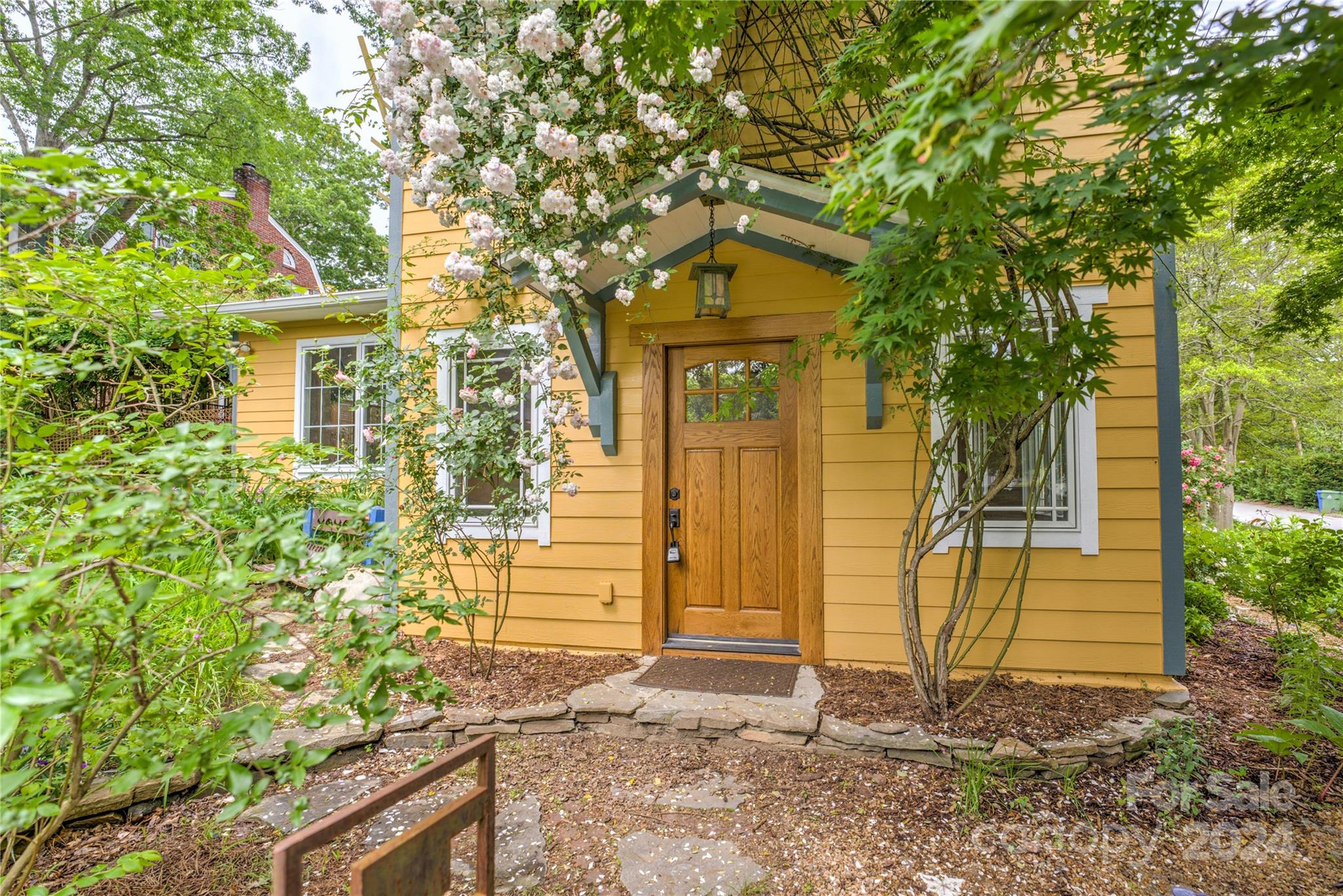 2 Devonshire Place Asheville, NC 28803 - Photo 37 of 47 a front view of a house with a yard