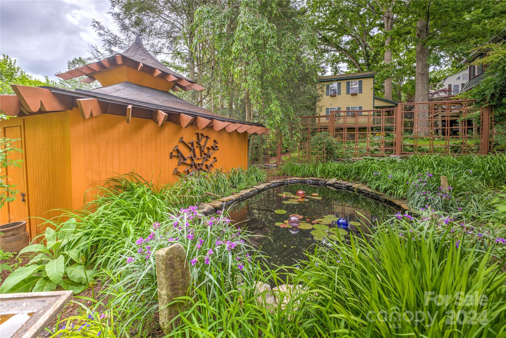 2 Devonshire Place Asheville, NC 28803 - Photo 39 of 47 a view of a yard with plants