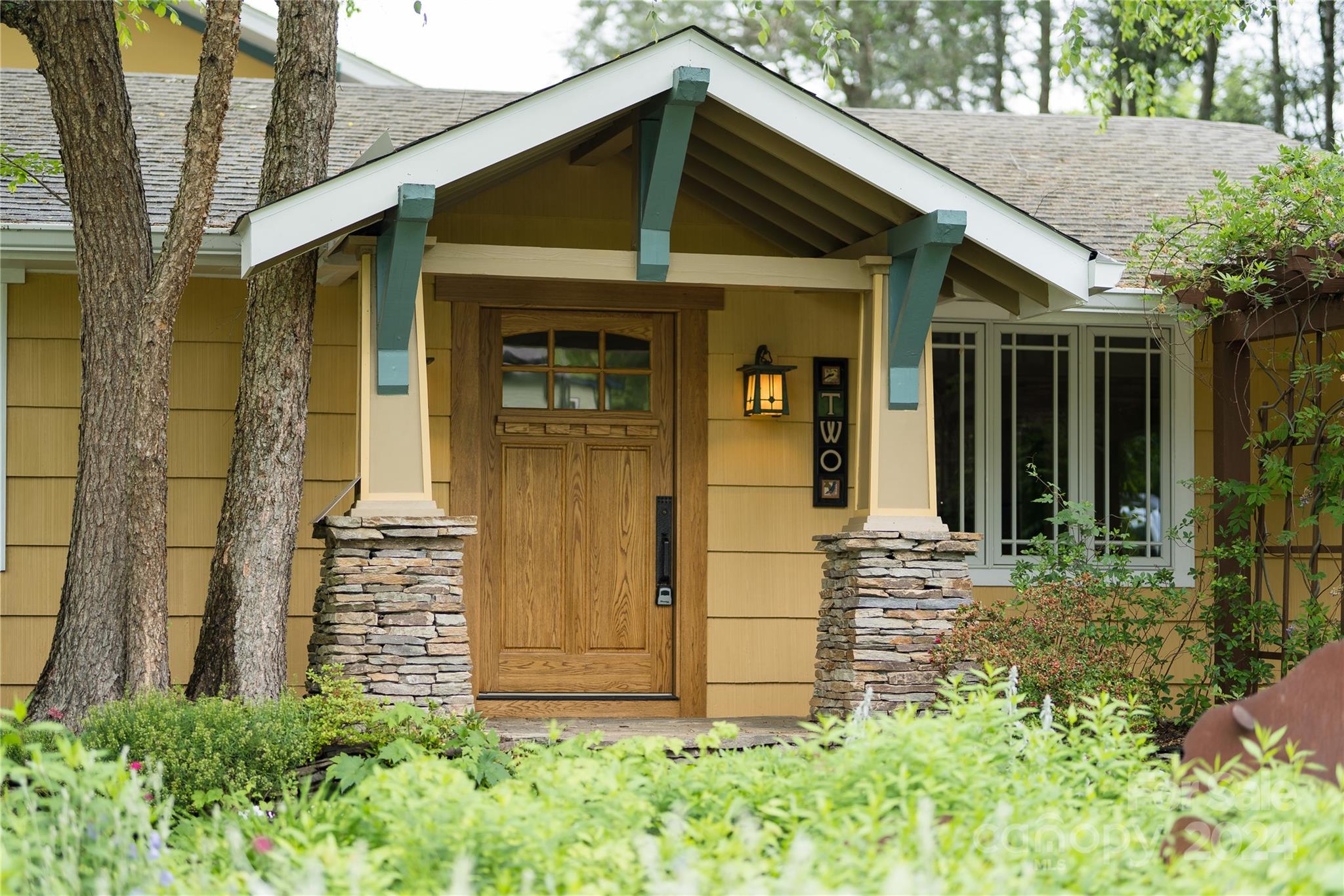 2 Devonshire Place Asheville, NC 28803 - Photo 42 of 47 front view of a house with potted plants