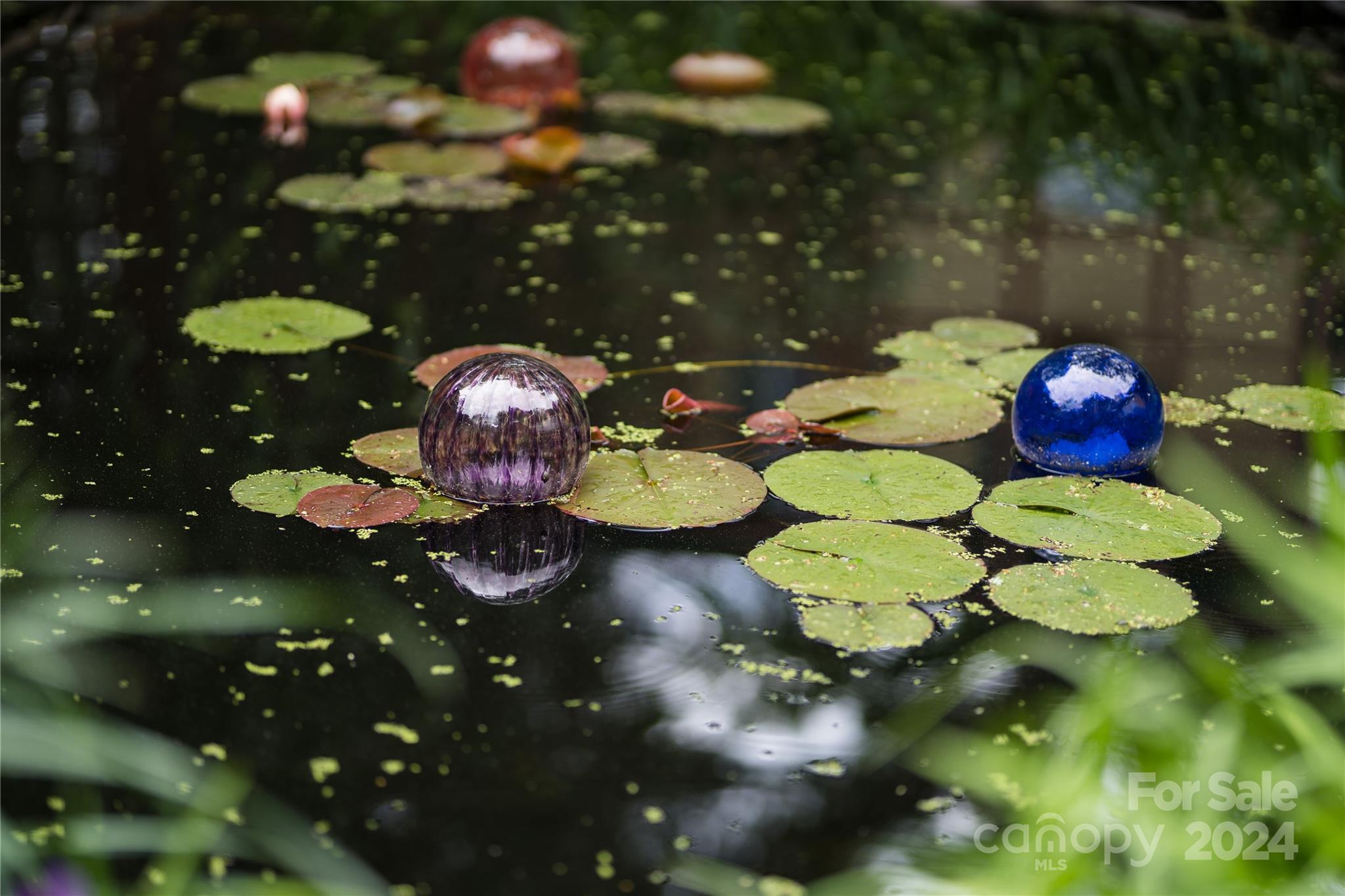 2 Devonshire Place Asheville, NC 28803 - Photo 47 of 47 a bathroom with a sink and a mirror