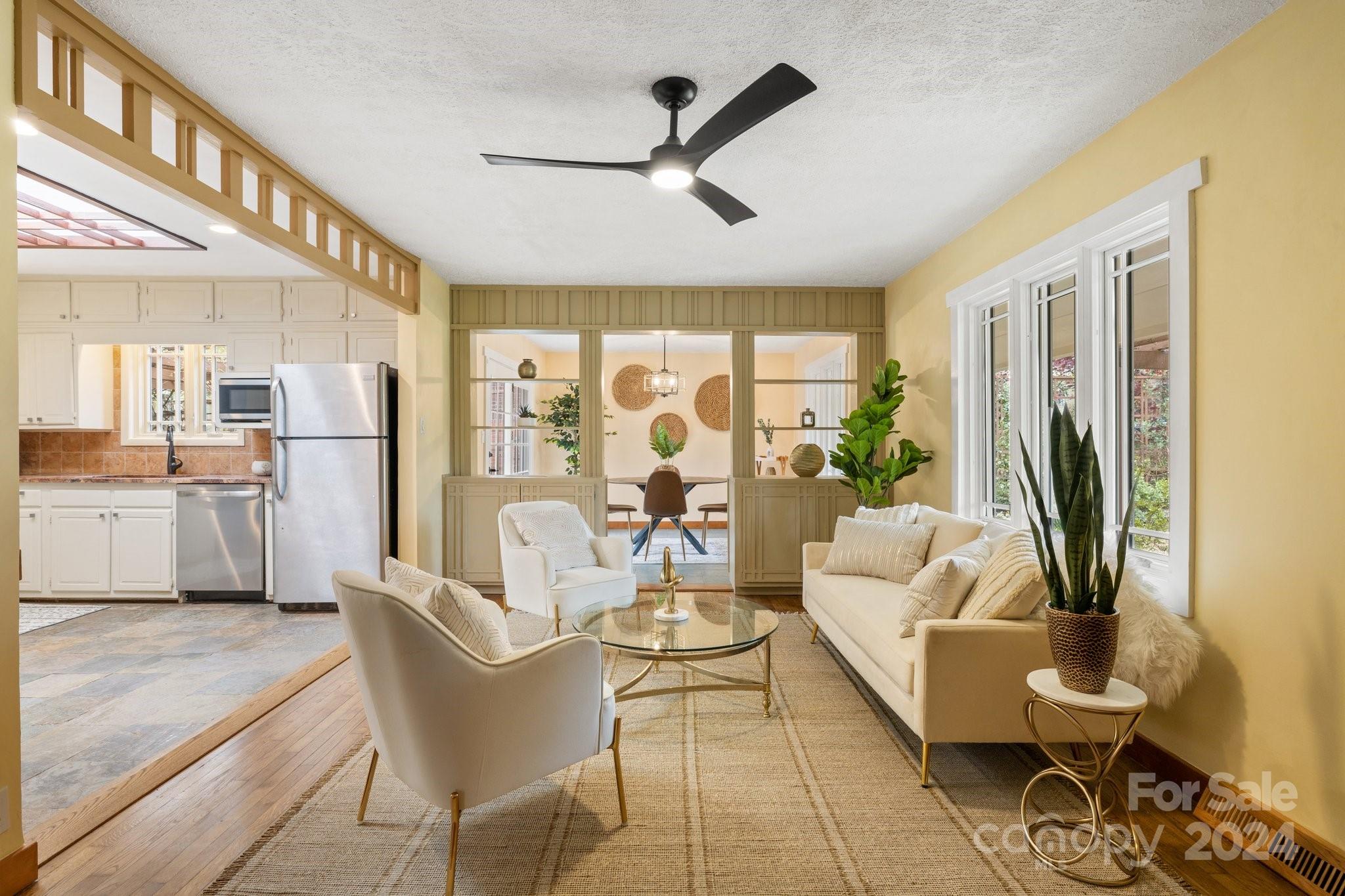 2 Devonshire Place Asheville, NC 28803 - Photo 10 of 47 a living room with furniture and a large window