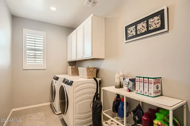 a view of roof deck with seating space and potted plants