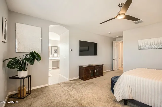 a bathroom with a double vanity sink and mirror