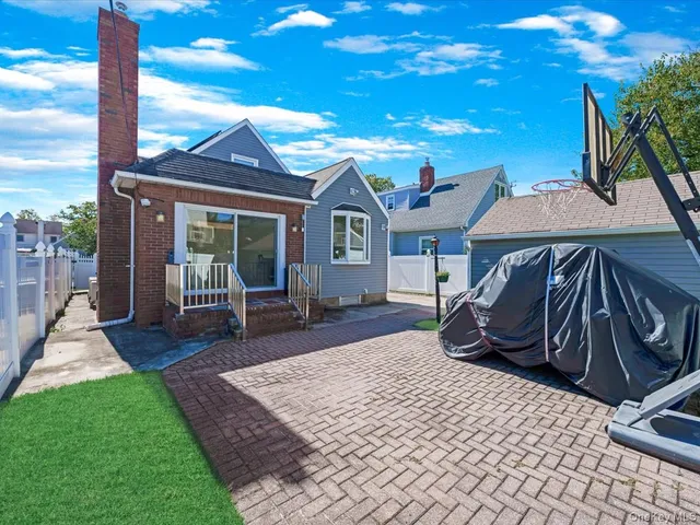 a view of a house with a patio