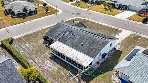 a view of a balcony with chairs