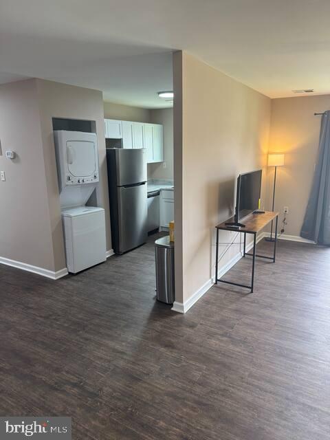 3924 Rolling Rd., Unit B11 Pikesville, MD 21208 - Photo 12 of 17 a view of a kitchen with furniture and wooden floor