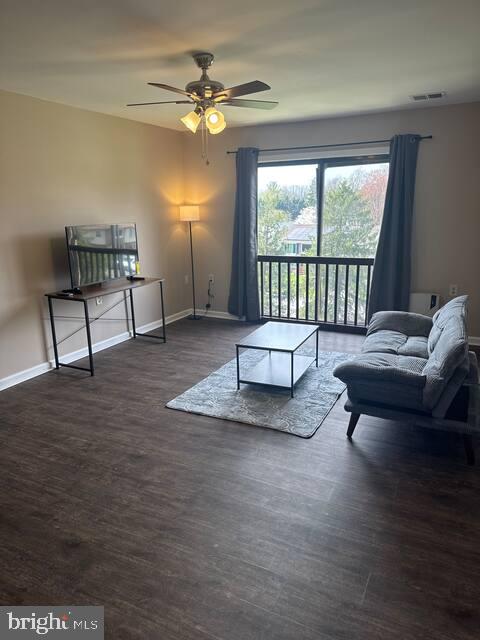3924 Rolling Rd., Unit B11 Pikesville, MD 21208 - Photo 5 of 17 a living room with furniture and a large window