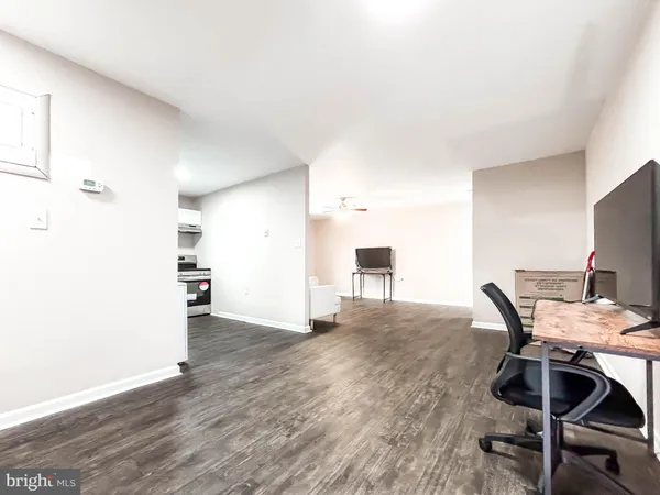 a workspace with furniture and bathroom