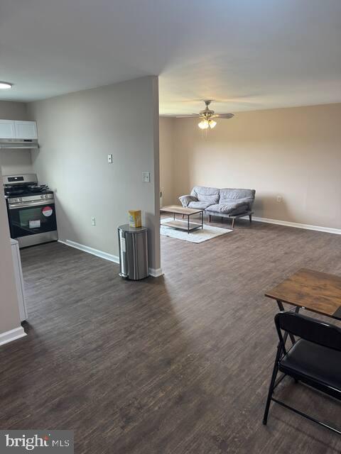 3924 Rolling Rd., Unit B11 Pikesville, MD 21208 - Photo 9 of 17 a living room with furniture and a wooden floor