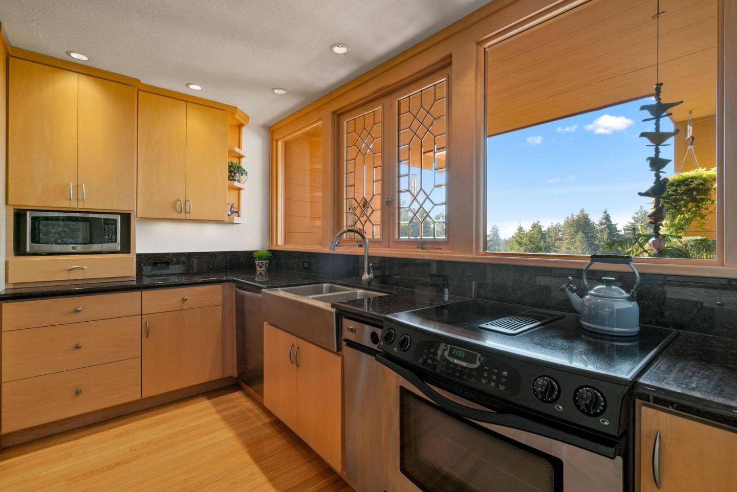 7625 Oak Ridge Road Aptos, CA 95003 - Photo 23 of 67 a kitchen with a sink a stove and cabinets