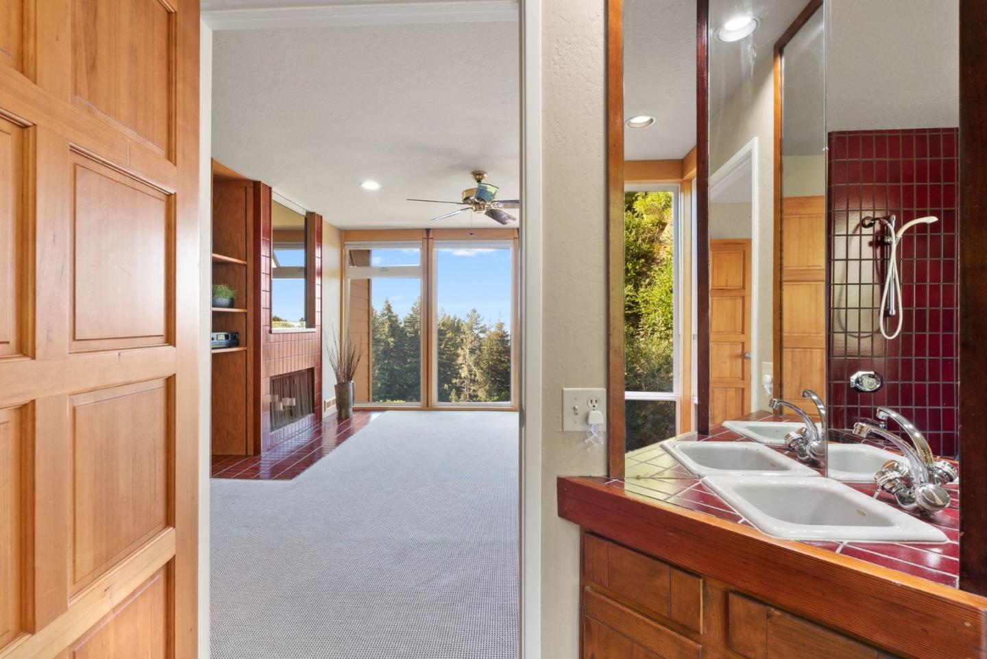 7625 Oak Ridge Road Aptos, CA 95003 - Photo 30 of 67 a spacious bathroom with a double vanity sink and a large mirror