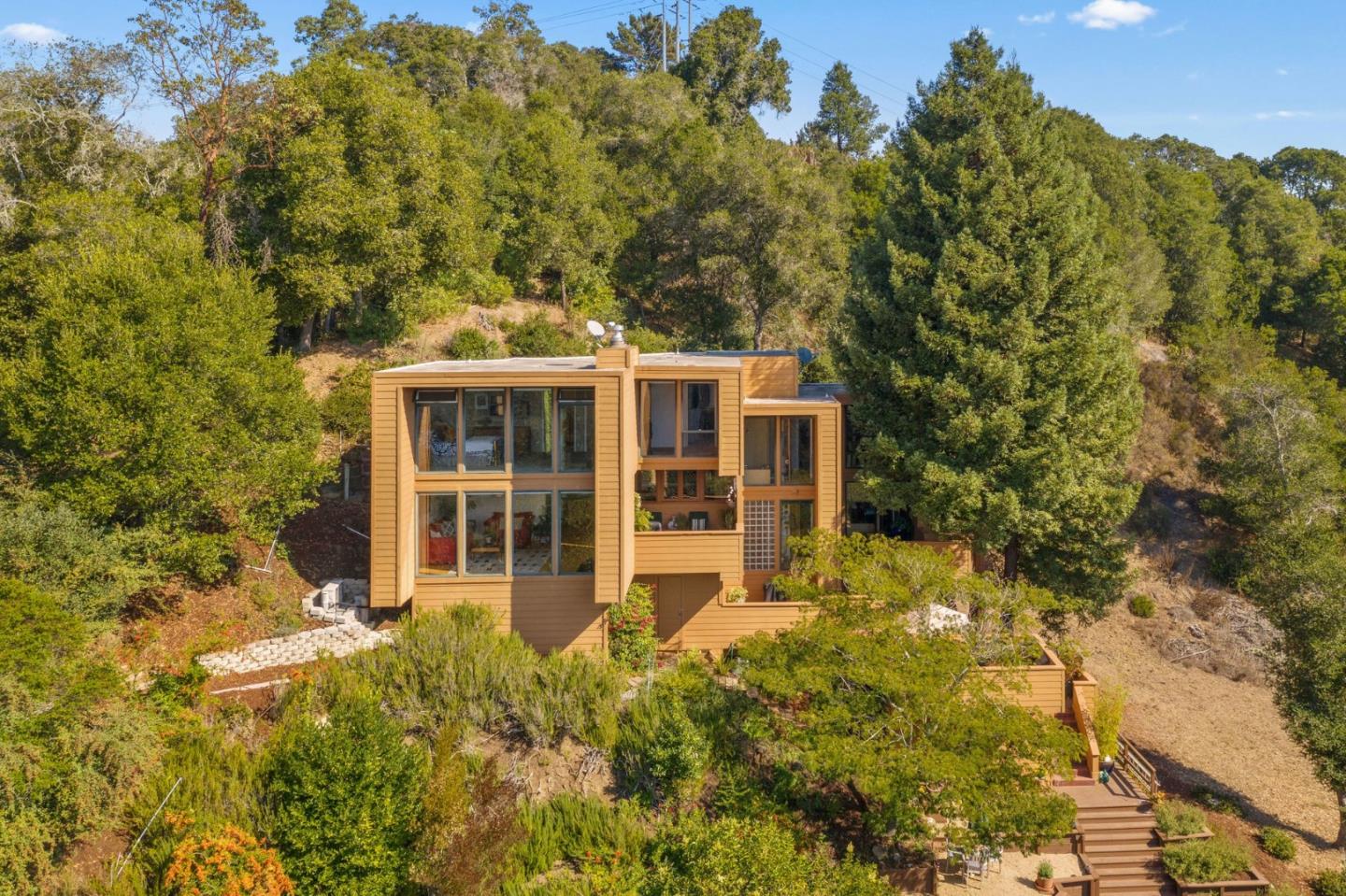 7625 Oak Ridge Road Aptos, CA 95003 - Photo 3 of 67 a view of a house with a large window and plants