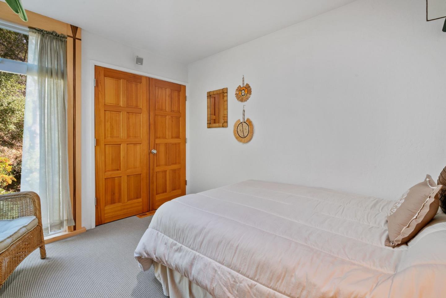 7625 Oak Ridge Road Aptos, CA 95003 - Photo 36 of 67 a bedroom with a bed and a window