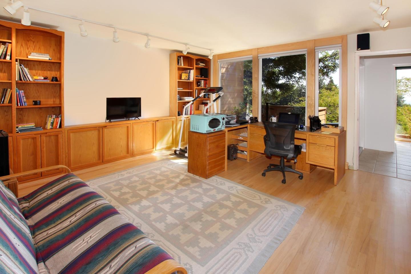 7625 Oak Ridge Road Aptos, CA 95003 - Photo 43 of 67 a bedroom with furniture and a wooden floor