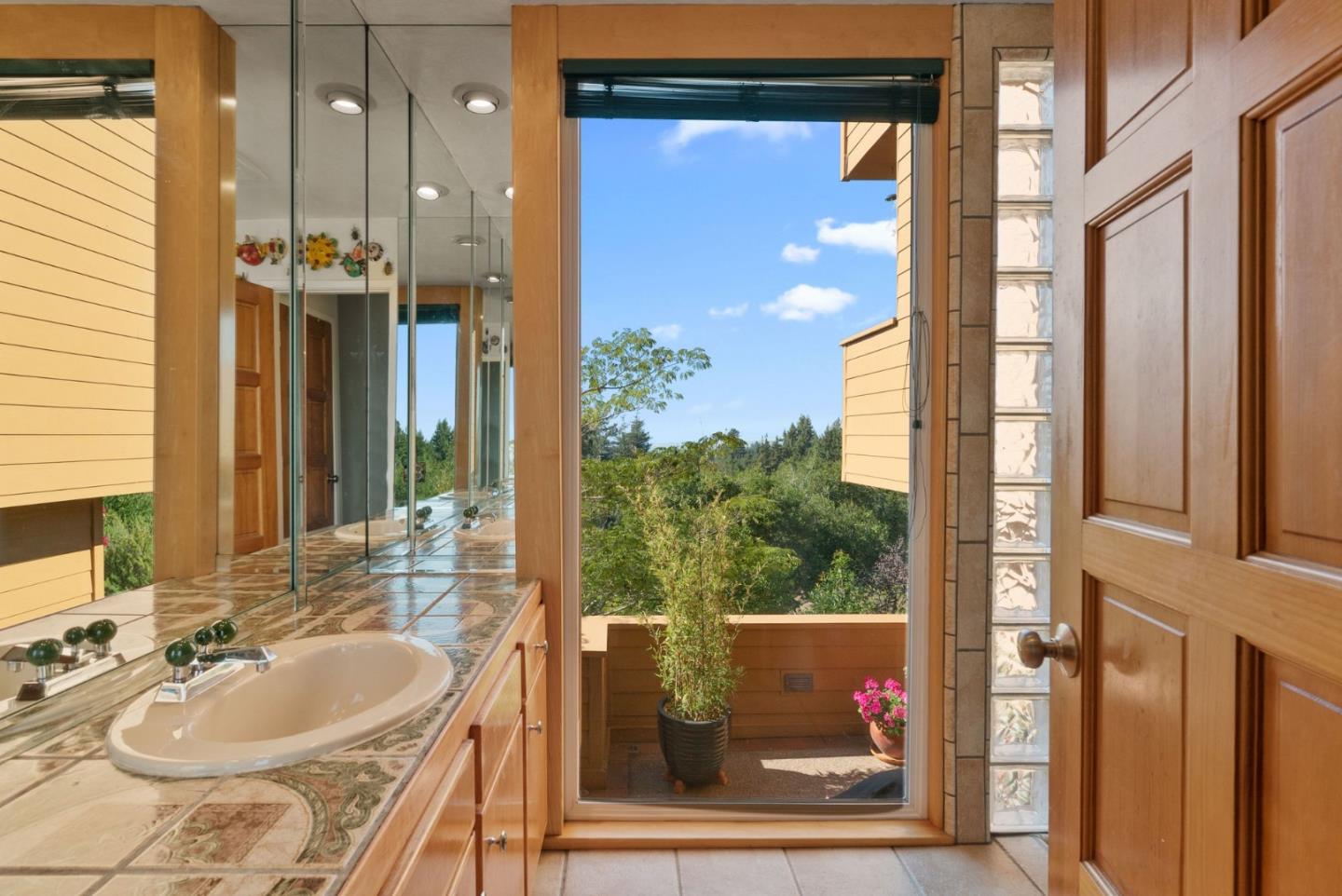 7625 Oak Ridge Road Aptos, CA 95003 - Photo 44 of 67 a bathroom with a sink double vanity and a mirror
