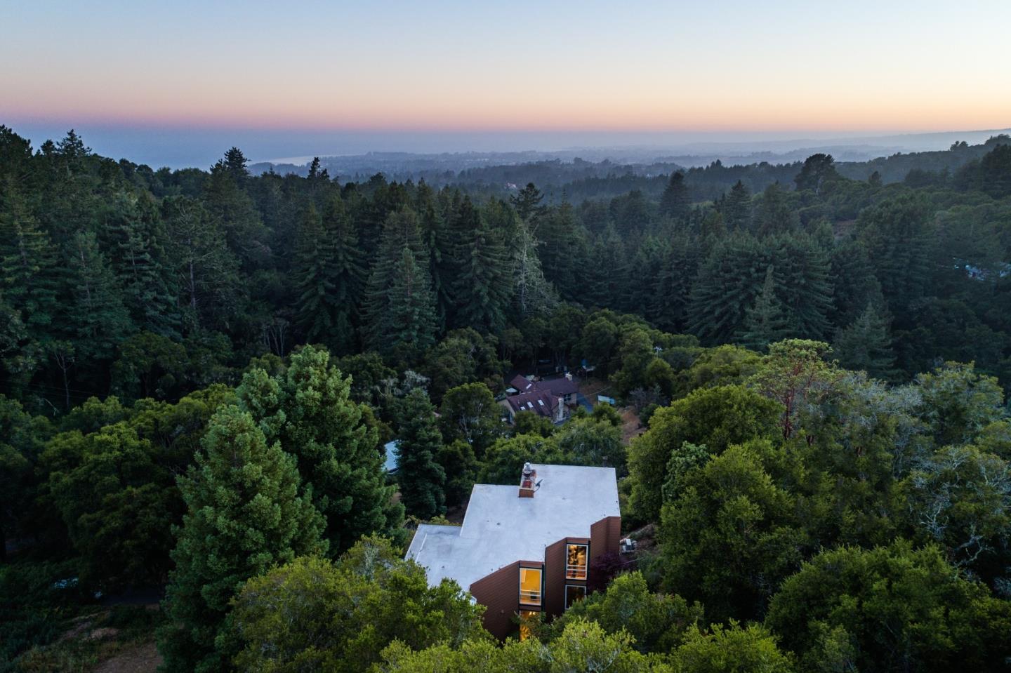 7625 Oak Ridge Road Aptos, CA 95003 - Photo 5 of 67 an aerial view of a city with lots of residential buildings and mountain view in back