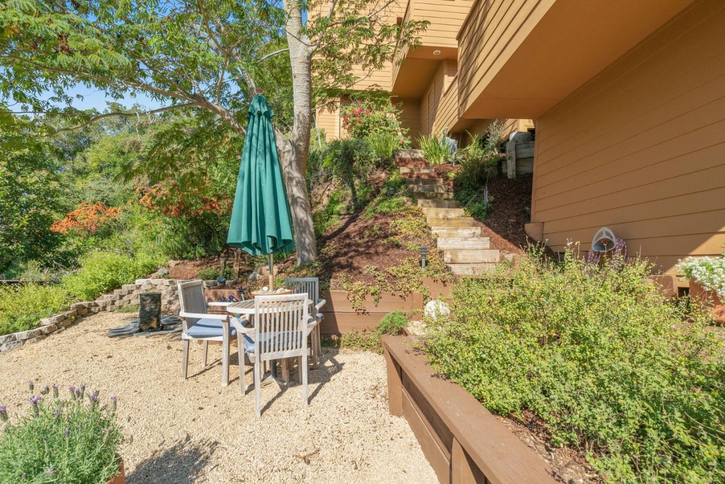7625 Oak Ridge Road Aptos, CA 95003 - Photo 53 of 67 a view of a chairs and table in backyard