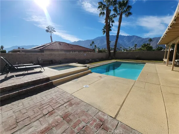 a view of outdoor space with swimming pool