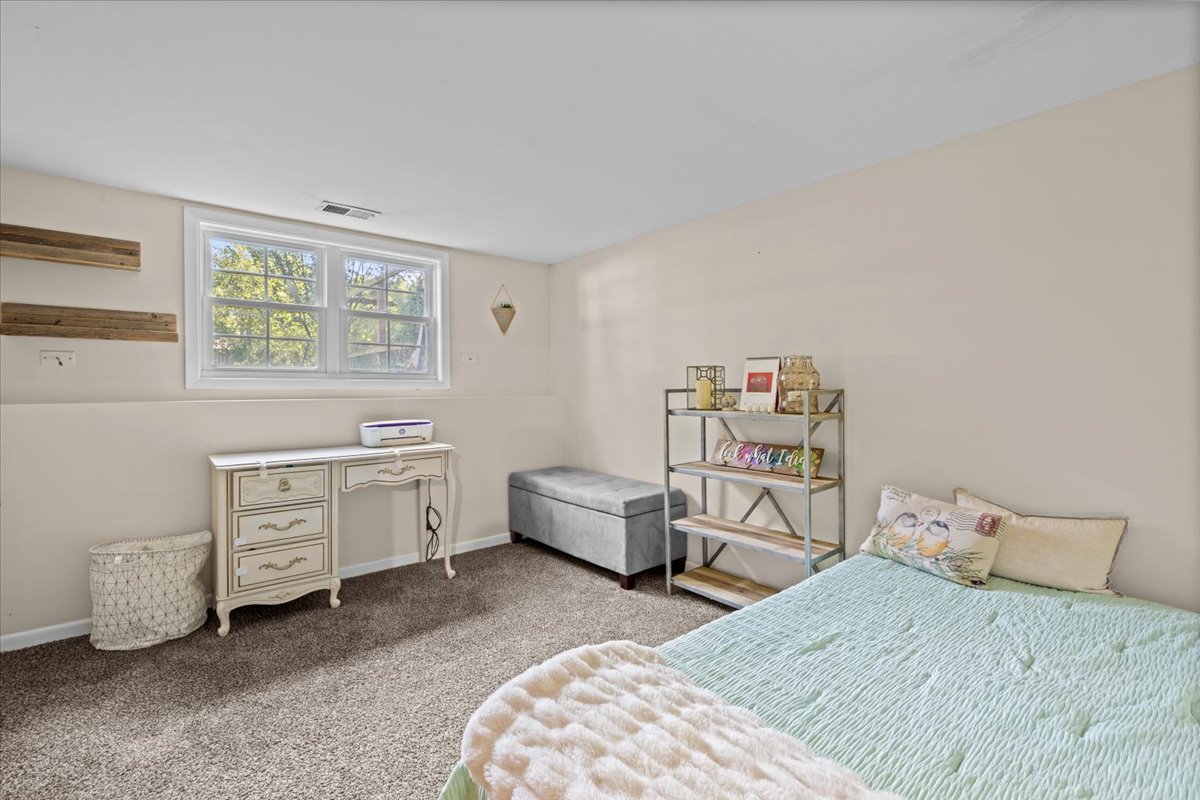 2-n651 Beith Road Elburn, IL 60119 - Photo 20 of 24 a bedroom with a bed and a window