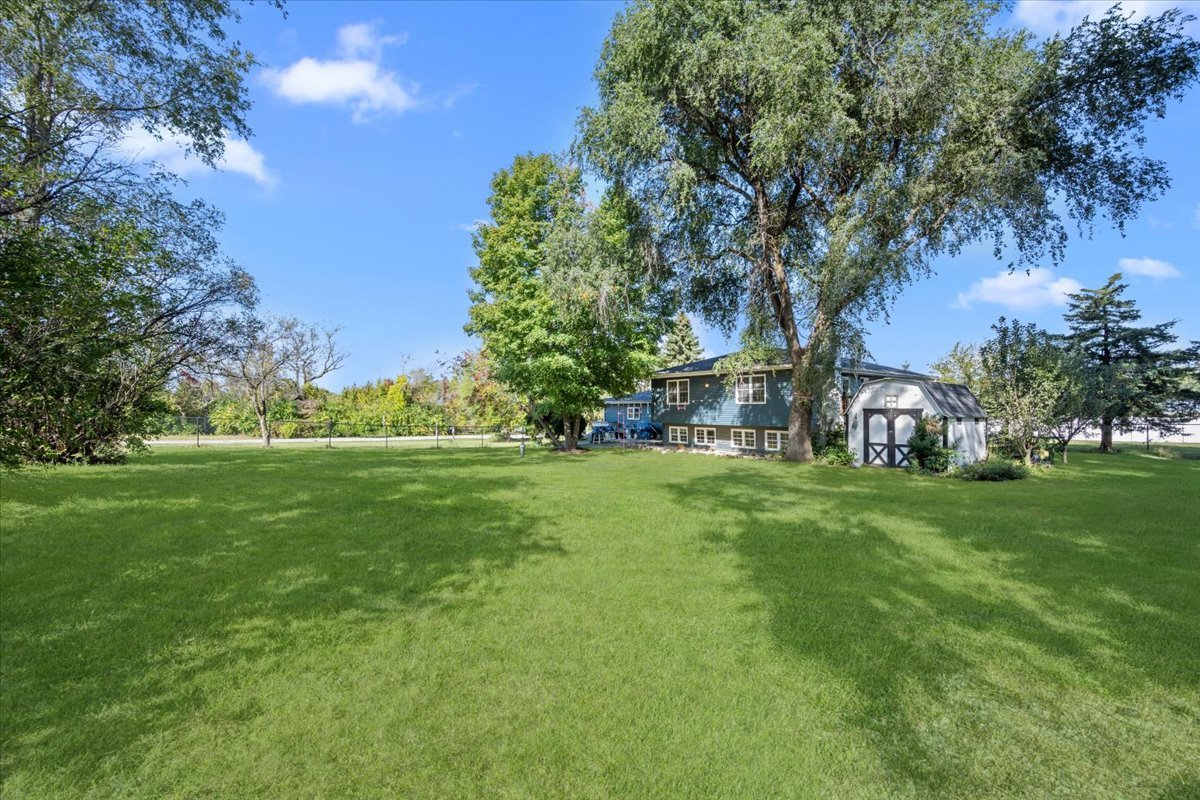 2-n651 Beith Road Elburn, IL 60119 - Photo 24 of 24 a front view of a house with garden