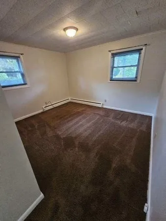 an empty room with a workbench