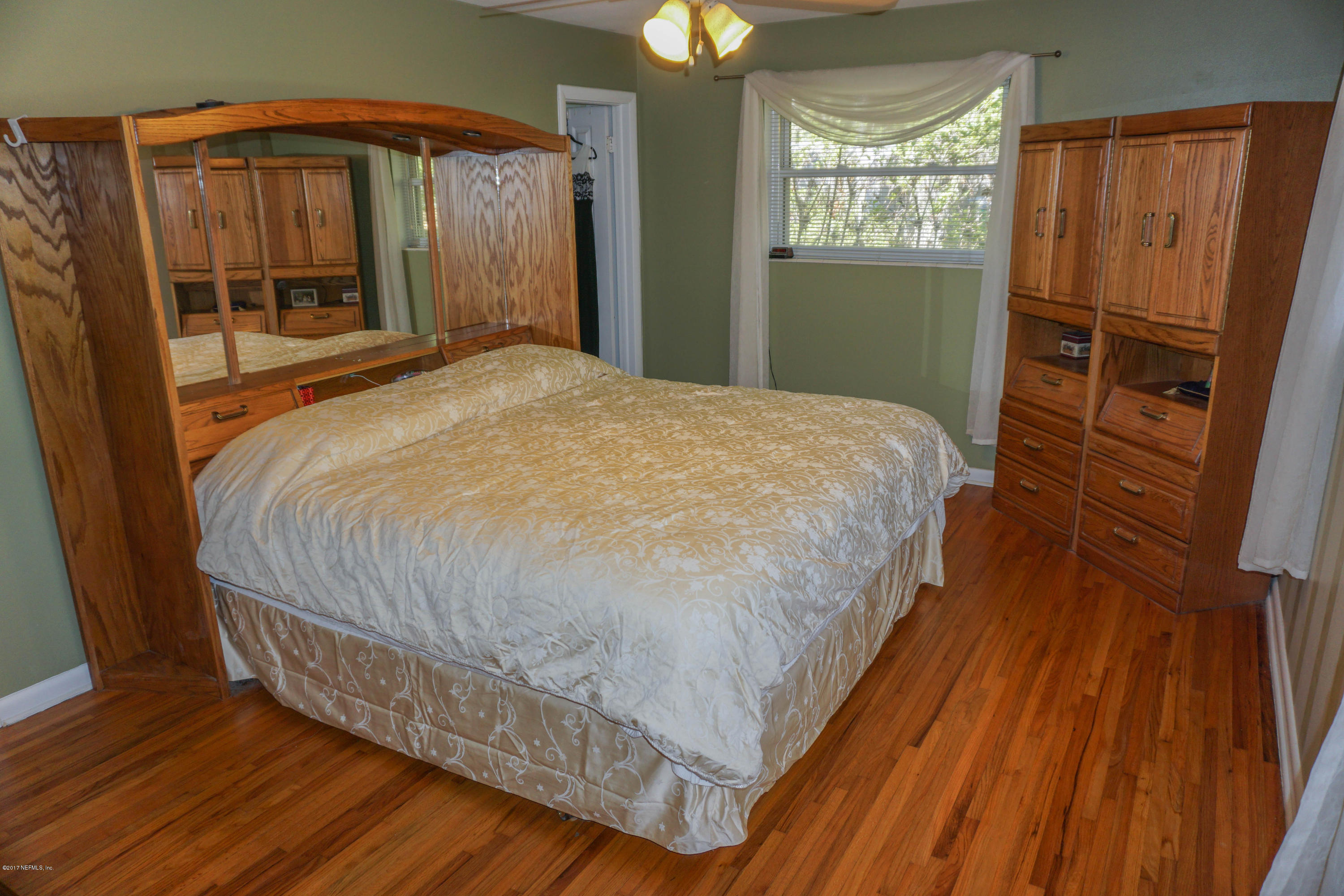 2190 Mills Road Jacksonville, FL 32216 - Photo 14 of 44 Owner's Bedroom