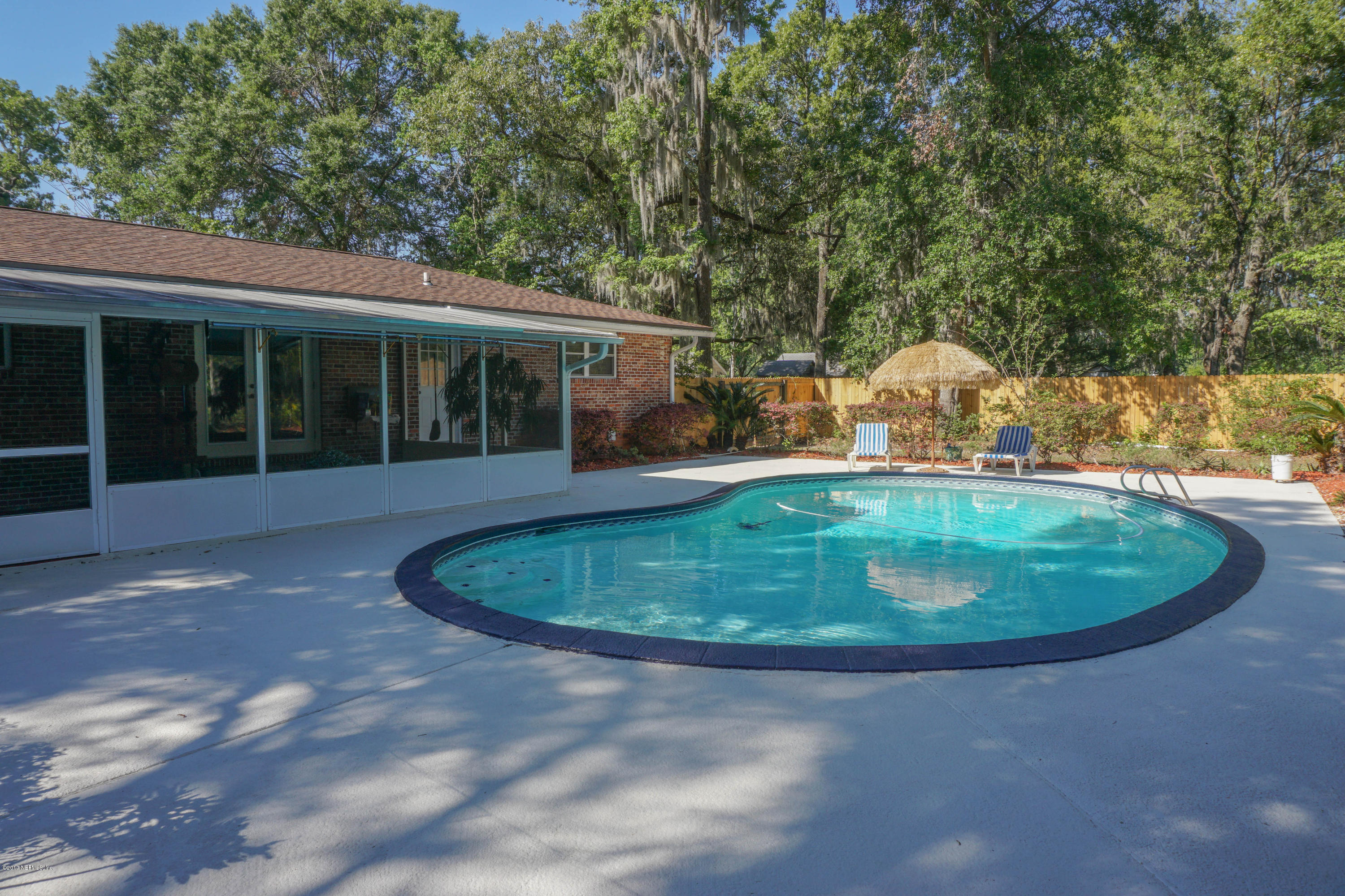 2190 Mills Road Jacksonville, FL 32216 - Photo 22 of 44 Inground pool with salt system