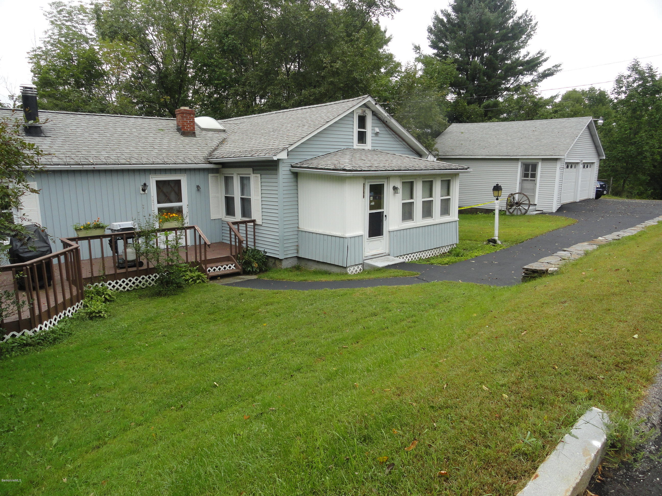 2288 State Road Richmond, MA 01254 - Photo 2 of 10 a front view of a house with garden