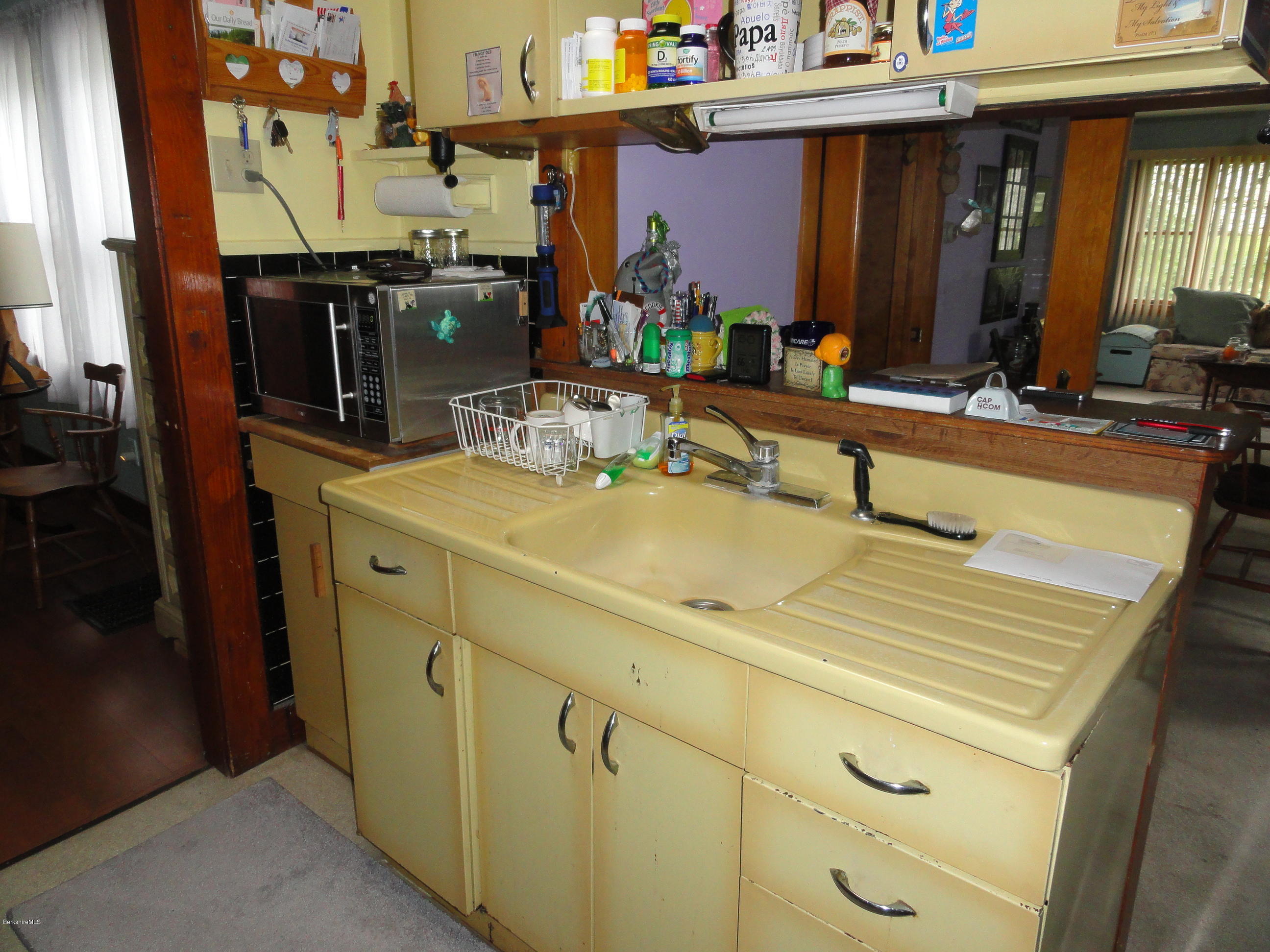 2288 State Road Richmond, MA 01254 - Photo 9 of 10 a room with a sink and cabinets