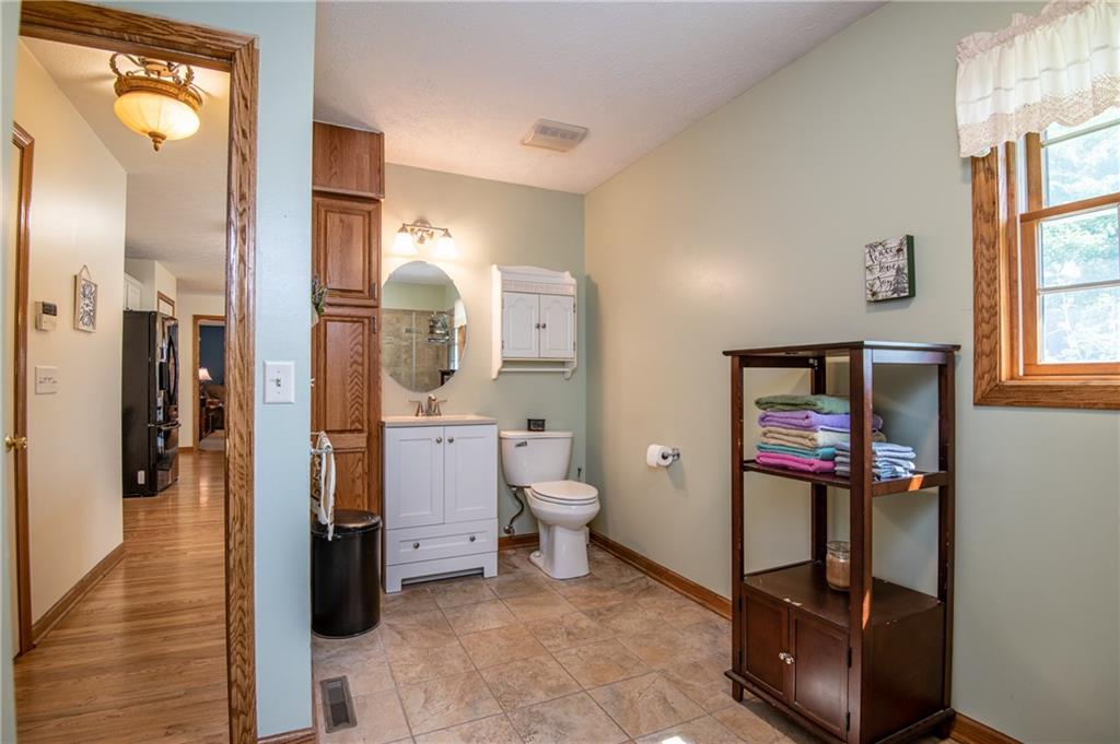 300 North Keel Ridge Road Hermitage, PA 16148 - Photo 12 of 25 Beautiful main level full bathroom with walk in shower.