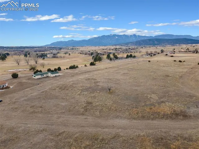 a view of an ocean beach and city