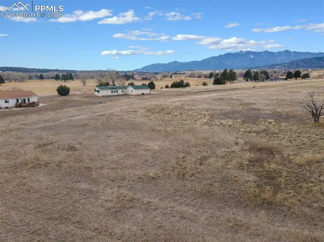 a view of an outdoor space and mountain view