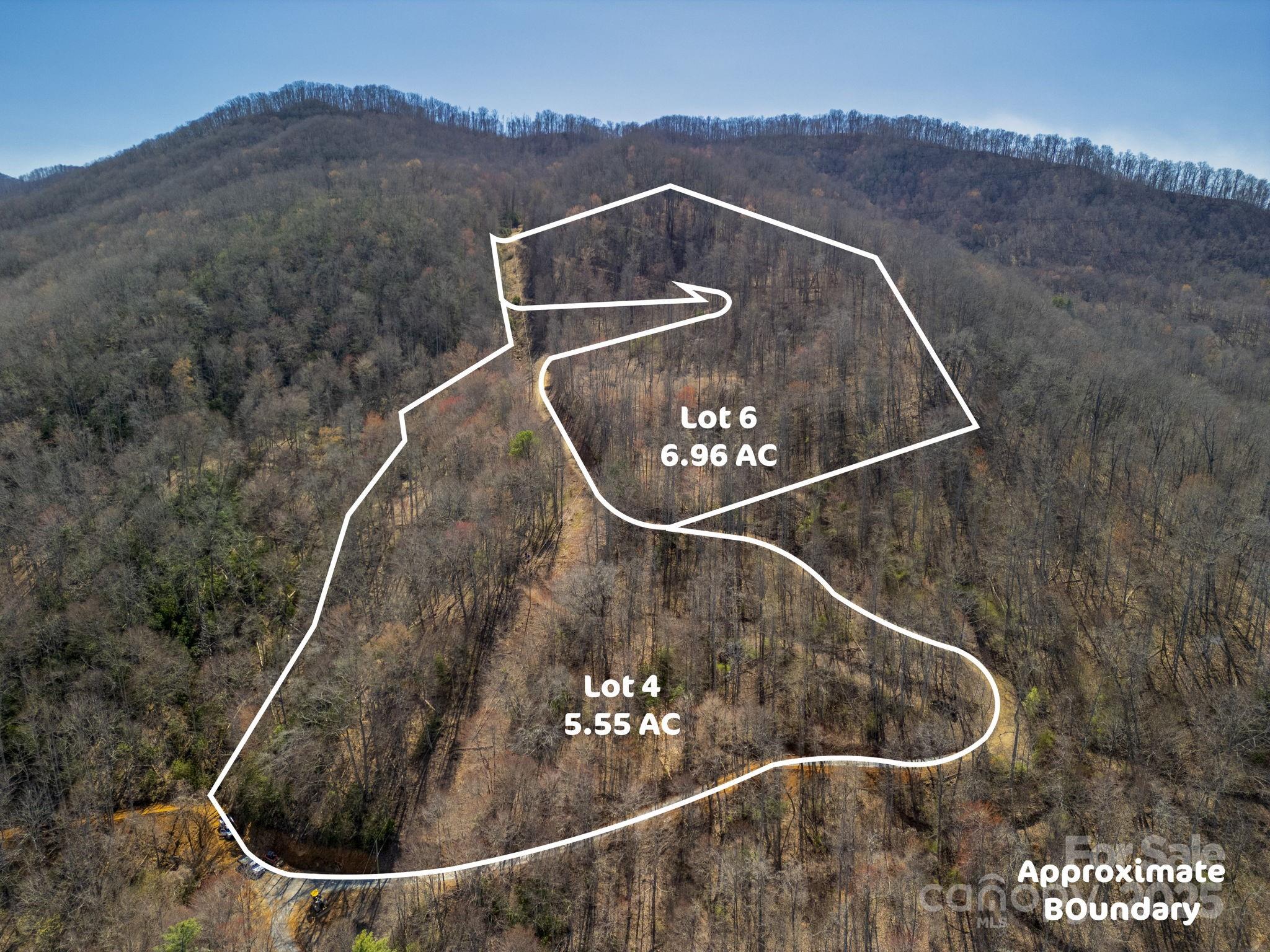 4 Copperhead Cove Road Sylva, NC 28779 - Photo 20 of 28 an aerial view of a house