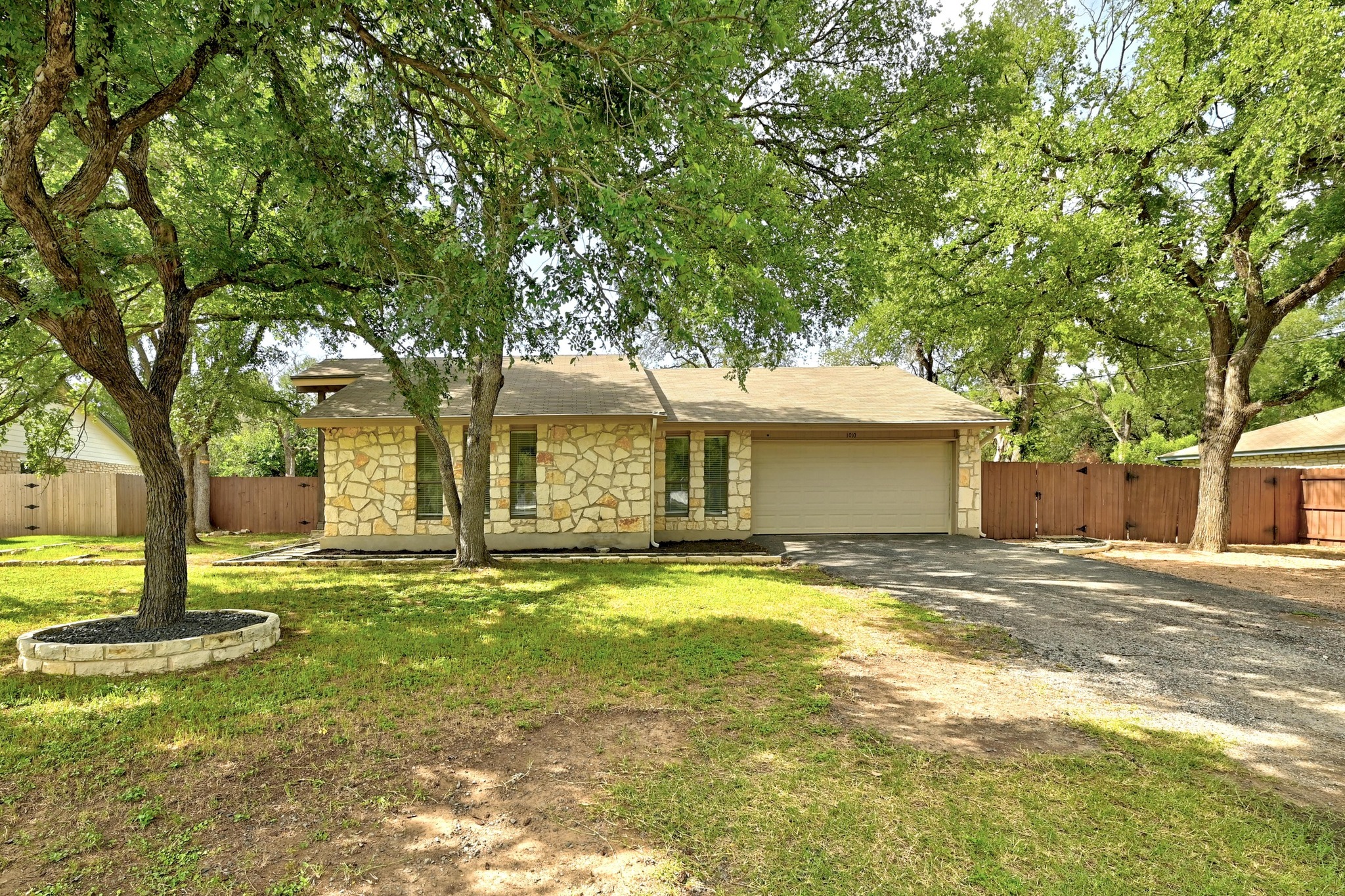 1010 Serenada Drive Georgetown, TX 78628 - Photo 1 of 1 a view of a house with a yard and tree s