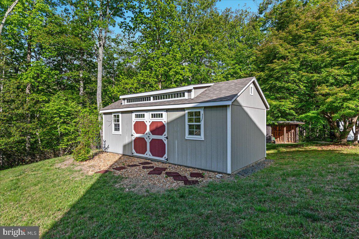146 Lizzie Mills Road Castleton, VA 22716 - Photo 53 of 91 a view of backyard with garden