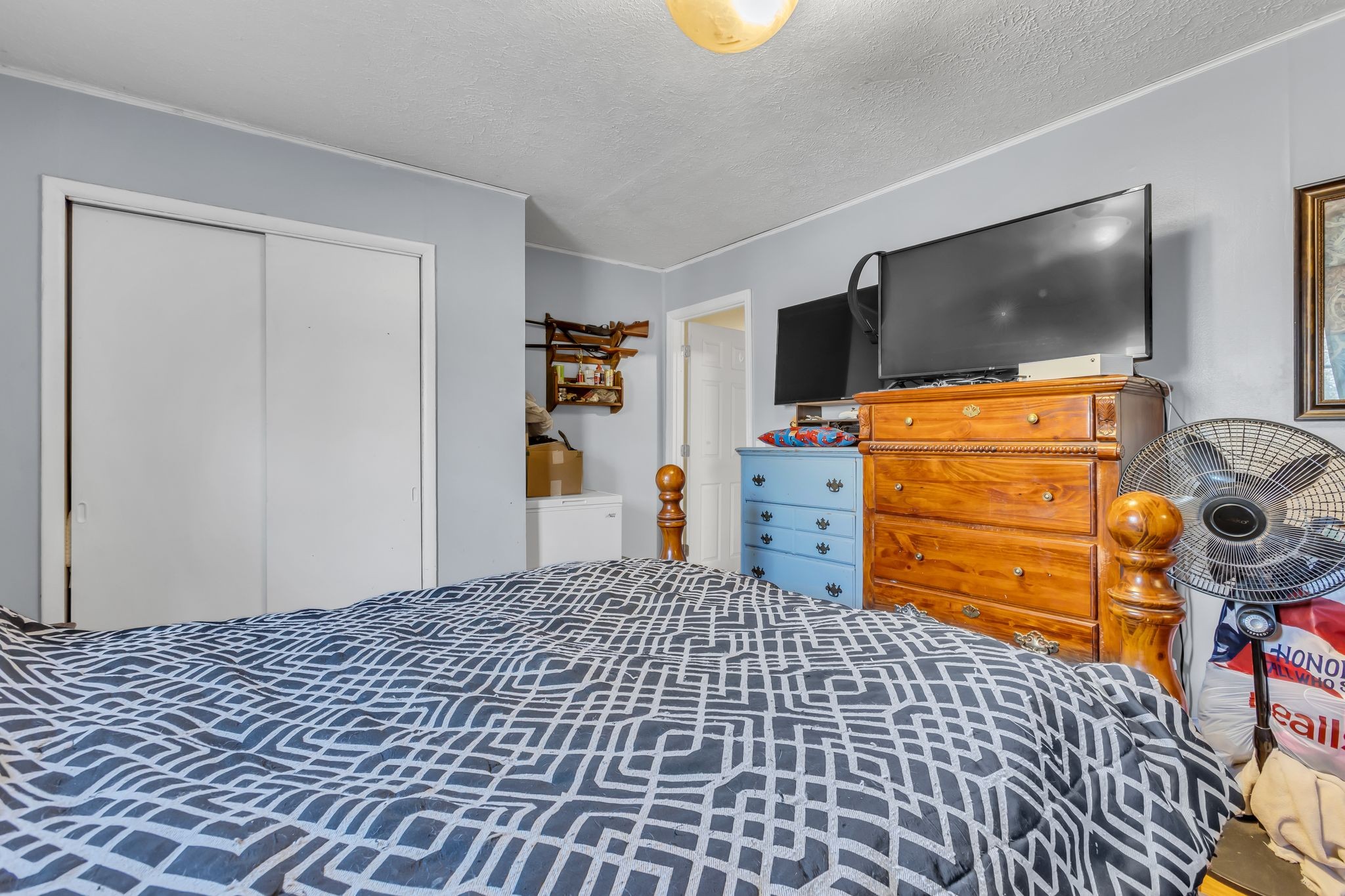 7880 Johnny Crow Road Lyles, TN 37098 - Photo 18 of 29 a bedroom with a bed and chair