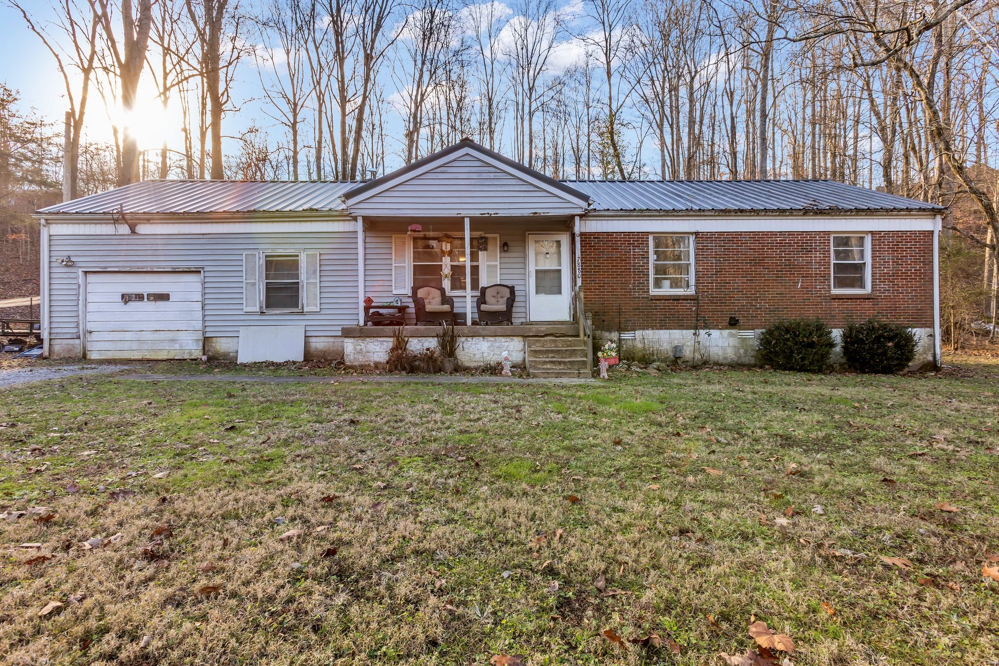 7880 Johnny Crow Road Lyles, TN 37098 - Photo 27 of 29 a front view of a house with garden