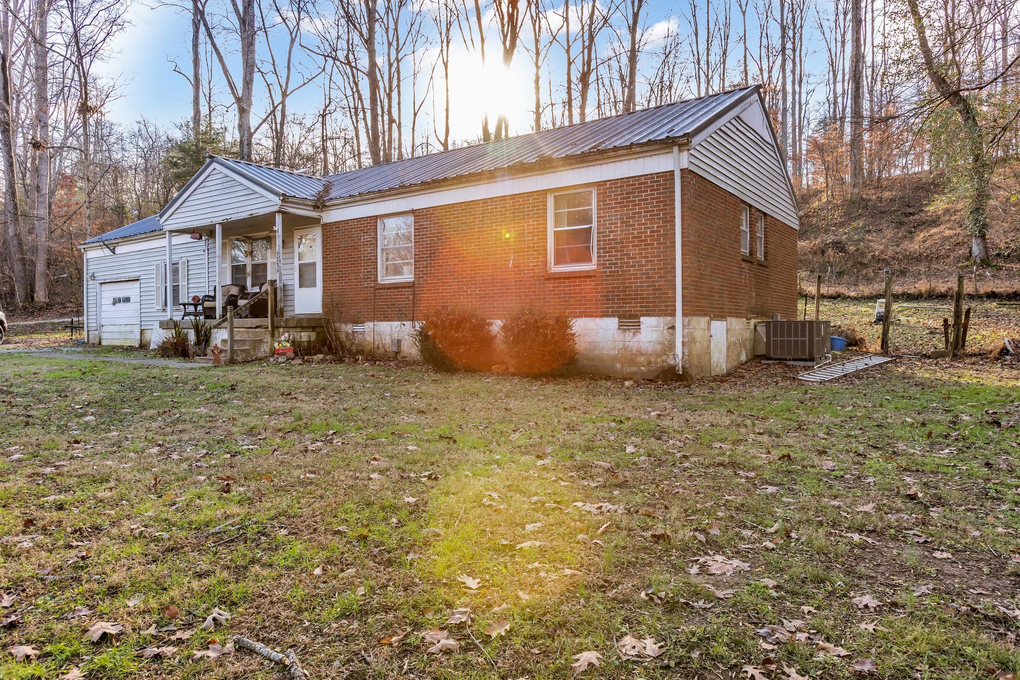 7880 Johnny Crow Road Lyles, TN 37098 - Photo 28 of 29 a view of a house with a yard