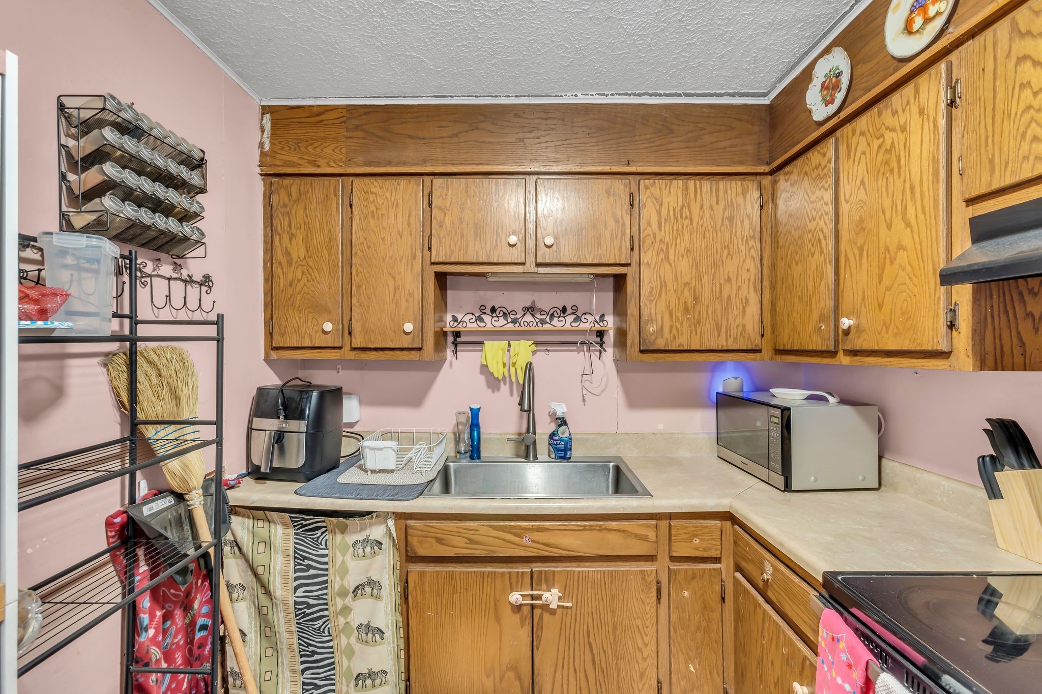 7880 Johnny Crow Road Lyles, TN 37098 - Photo 10 of 29 a kitchen with a sink cabinets and a window