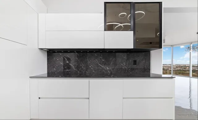 a close up of a white wall