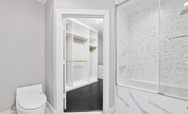 a view of an empty walk in closet