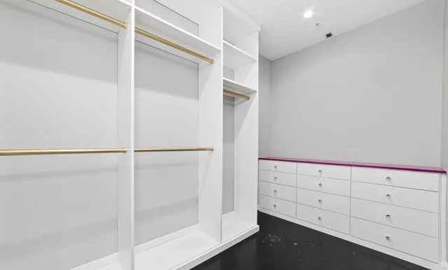 a view of an empty walk in closet