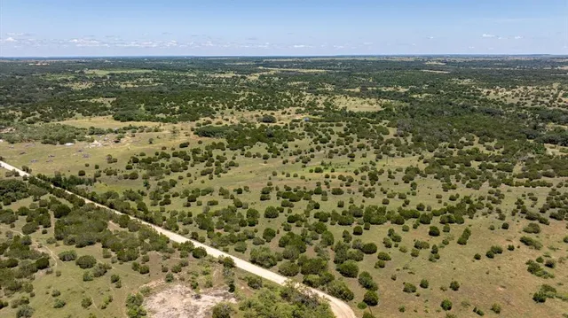 a view of a lake with a city