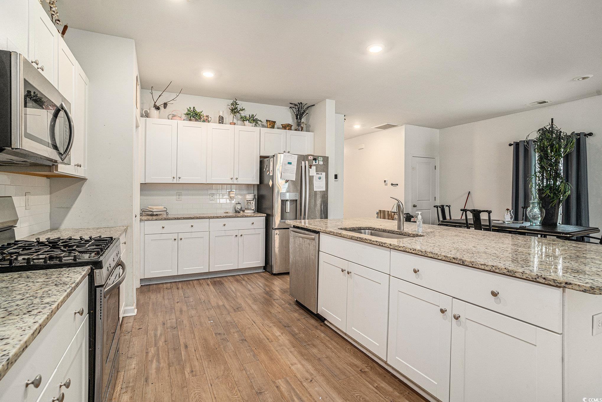 2059 Borgata Loop Longs, SC 29568 - Photo 12 of 34 Kitchen with appliances with stainless steel finis