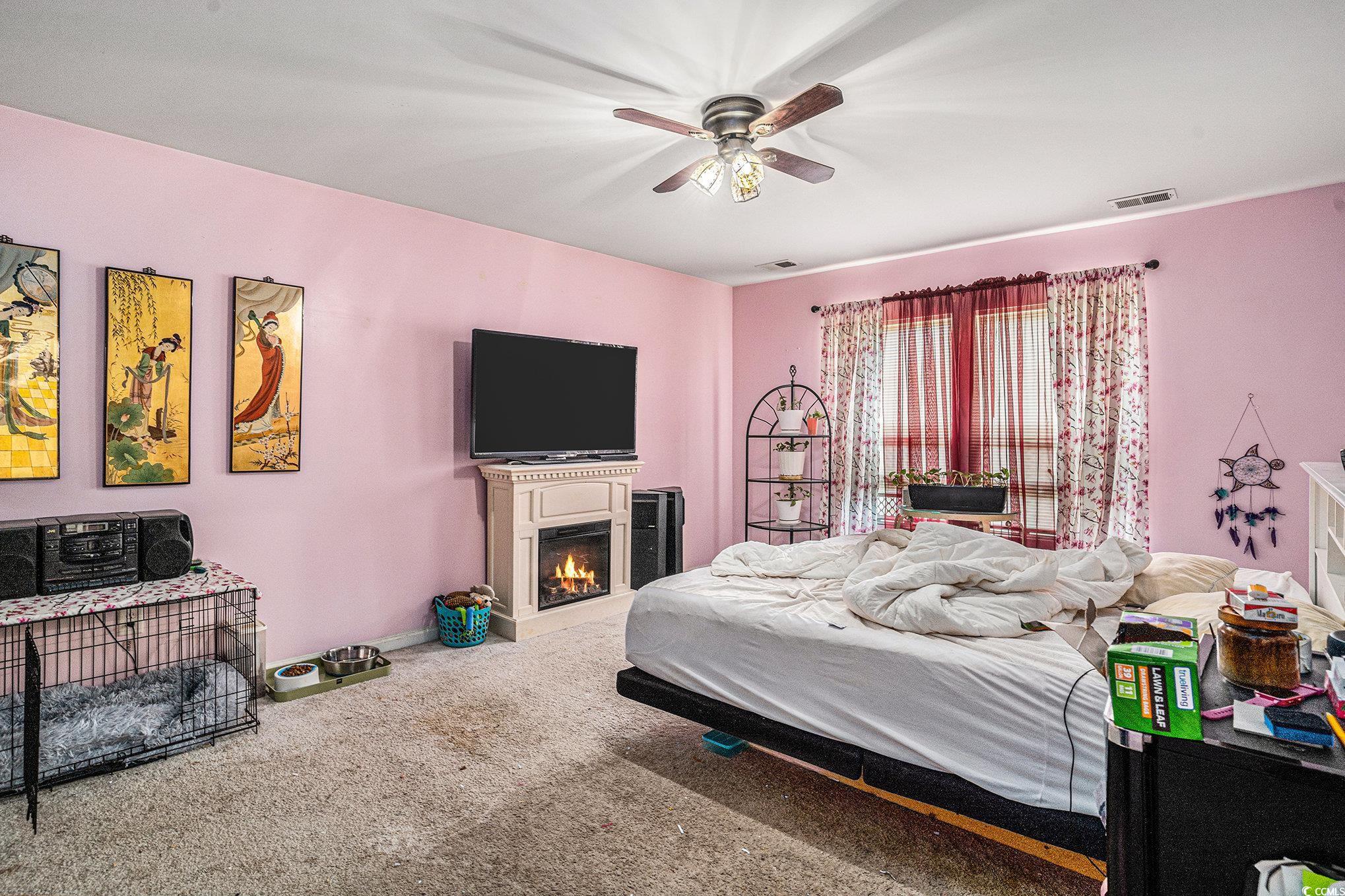 2059 Borgata Loop Longs, SC 29568 - Photo 13 of 34 Bedroom featuring carpet flooring, ceiling fan, a